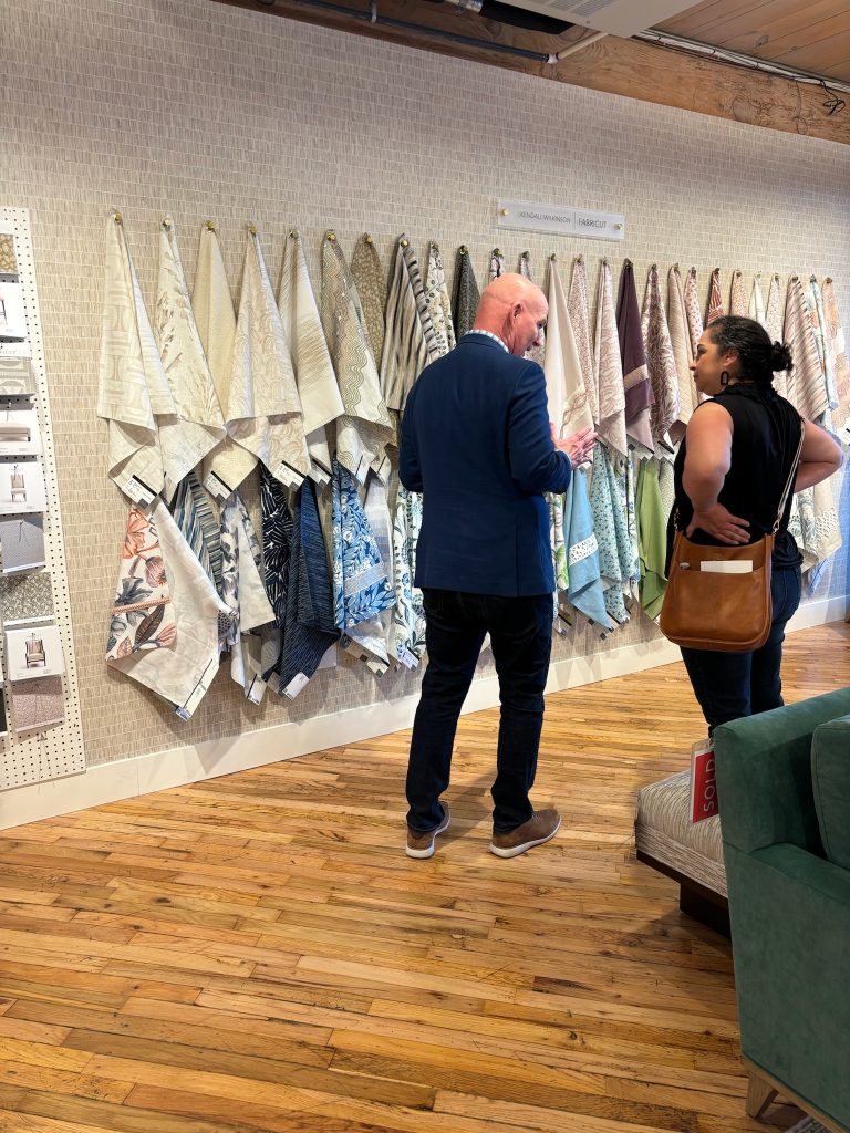Paola talking to Fabricut rep, Gary.
