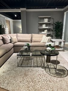 Glass coffee tables in living room vignette.