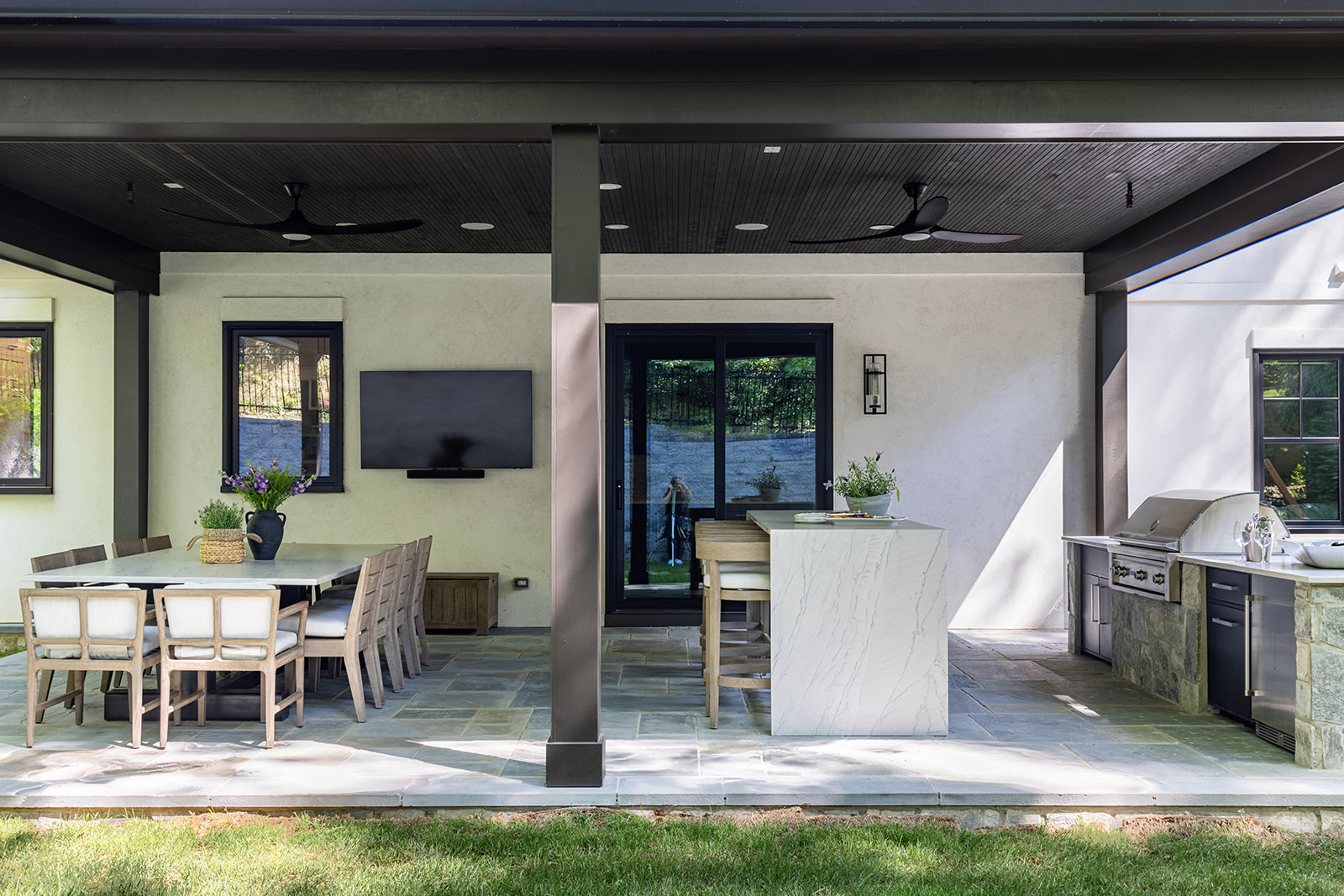 Picture of an outdoor patio with cozy seating.